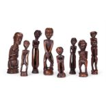 A GROUP OF EIGHT PAPUA NEW GUINEAN CARVED WOOD FIGURES, SEPIK AND SANDAUN PROVINCES