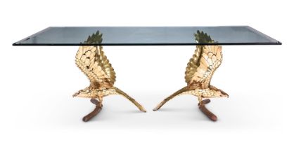 λ A POLISHED BRASS AND GLASS DINING TABLEBY ALAIN CHERVET, CIRCA 1977