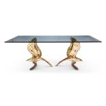 λ A POLISHED BRASS AND GLASS DINING TABLEBY ALAIN CHERVET, CIRCA 1977