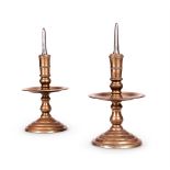 A PAIR OF FLEMISH BRASS OR BELL METAL PRICKET CANDLESTICKS, 18TH CENTURY