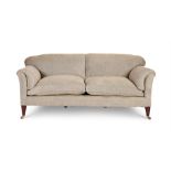 AN EDWARDIAN MAHOGANY AND UPHOLSTERED SOFA BY HOWARD & SONS, CIRCA 1905