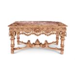 A FRENCH CARVED, CREAM PAINTED AND PARCEL GILT CENTRE TABLE OR 'TABLE DE MILIEU'