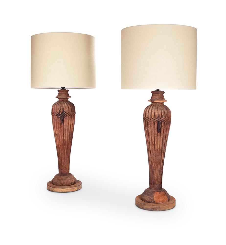 A LARGE PAIR OF ANGLO-INDIAN CARVED HARDWOOD COLUMNAR LAMPS