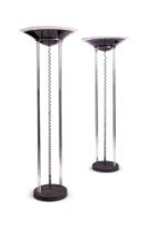 A LARGE PAIR OF CHROME AND LACQUERED GLASS STANDING UPLIGHTERS, CIRCA 1960