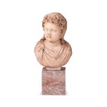 A CARVED MARBLE BUST OF A YOUNG BOY IN THE 2ND CENTURY ROMAN MANNER, POSSIBLY ITALIAN GRAND TOUR