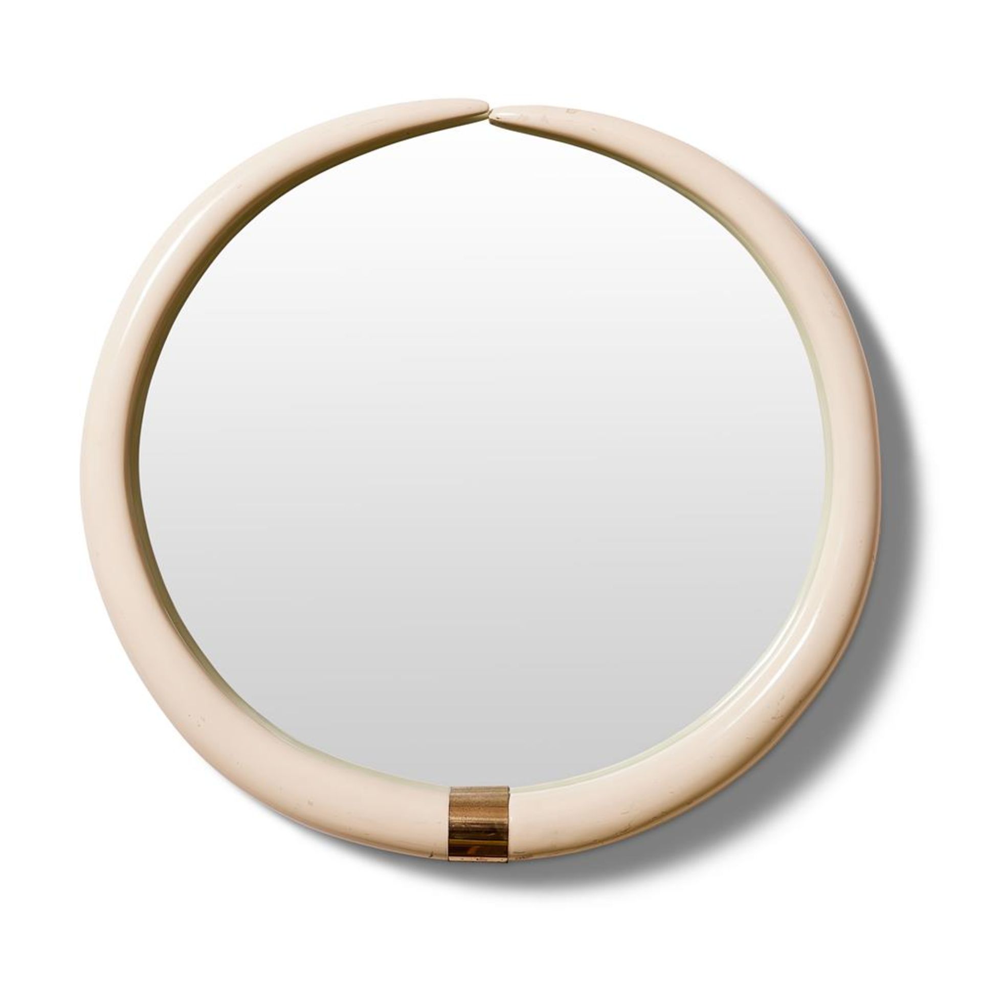 A LARGE BRASS MOUNTED FAUX TUSK MIRROR, CIRCA 1970