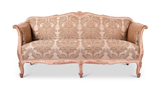 A SWEDISH CARVED, CREAM PAINTED AND DAMASK UPHOLSTERED SOFA, CIRCA 1880