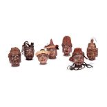 A SET OF SEVEN WOODEN PUPPET HEADS, NORTH INDIAN, 19TH CENTURY