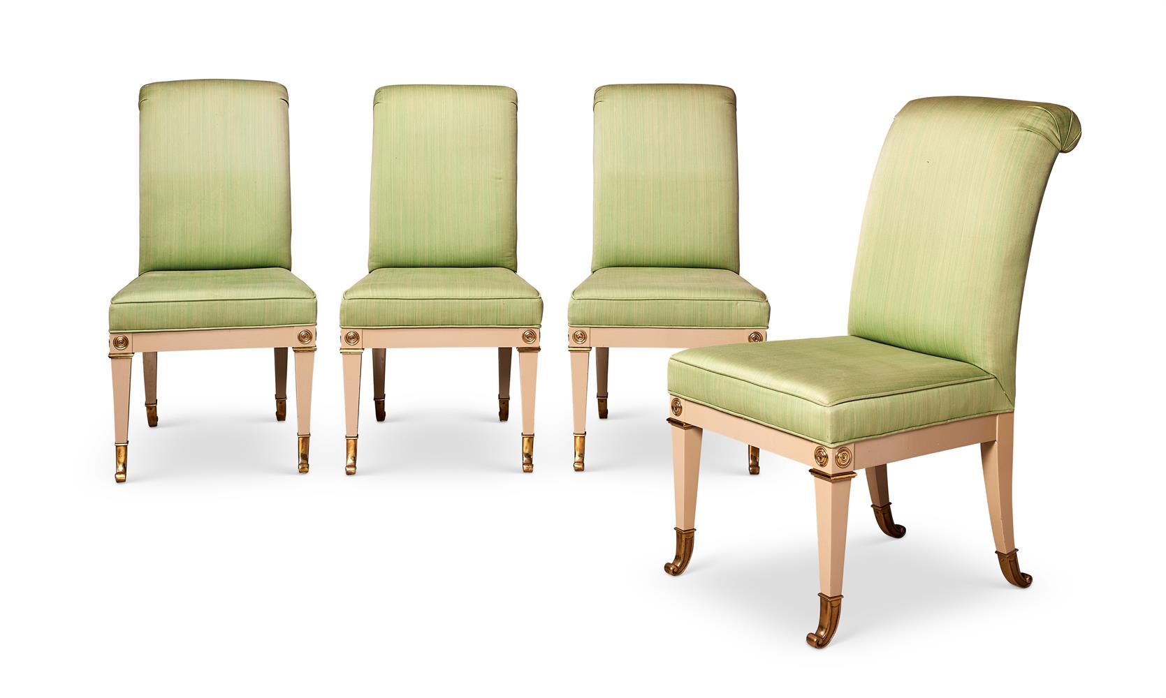 A SET OF FOUR CREAM LACQUERED AND GILT BRASS MOUNTED DINING CHAIRS IN THE EMPIRE STYLE, CIRCA 1975