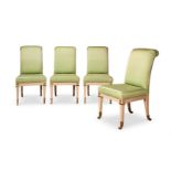 A SET OF FOUR CREAM LACQUERED AND GILT BRASS MOUNTED DINING CHAIRS IN THE EMPIRE STYLE, CIRCA 1975