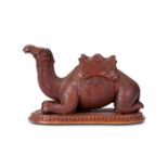 A CARVED HARDWOOD CAMEL INKWELL OR MATCHHOLDER, 19TH CENTURY