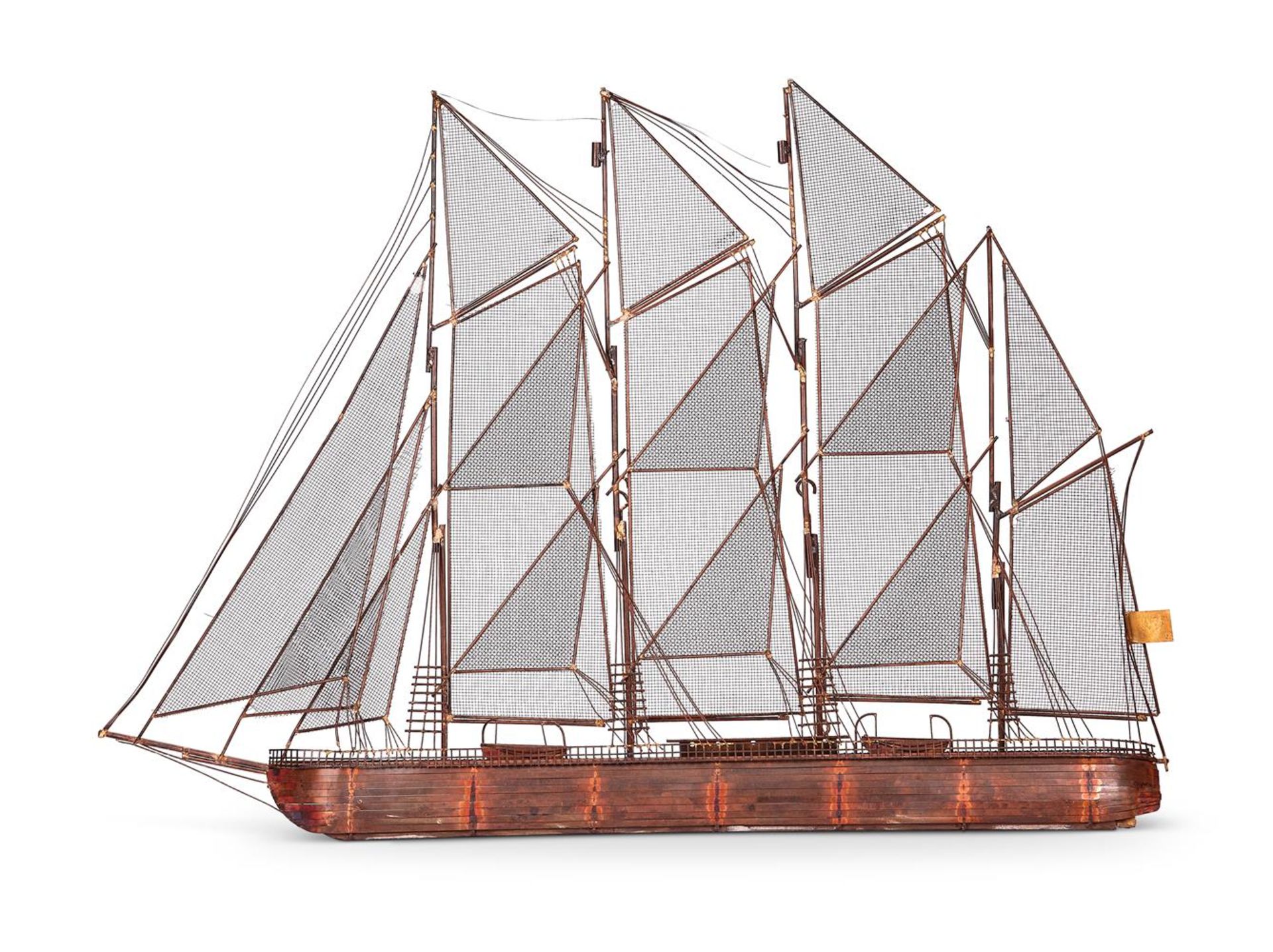 A WALL SCULPTURE OF A BRIG UNDER FULL SAIL BY CURTIS JERÉ, 1975