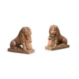 A PAIR OF TERRACOTTA SEATED LIONS, POSSIBLY FRENCH, 19TH CENTURY