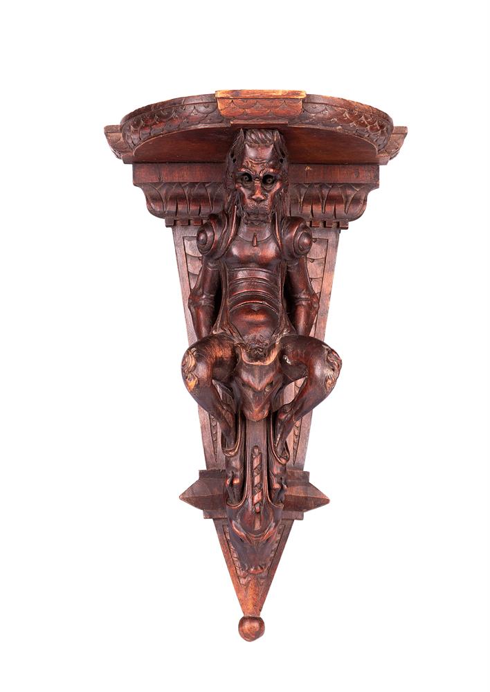 AN ITALIAN CARVED WALNUT WALL BRACKET, 19TH CENTURY