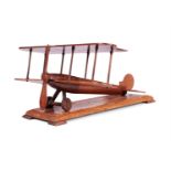 AN OAK AND WALNUT MODEL OF A GERMAN WWI BI-PLANE, FIRST QUARTER 20TH CENTURY