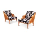 A PAIR OF RATTAN AND UPHOLSTERED BERGERE ARMCHAIRS BY THE BIELECKY BROTHERS, CIRCA 1980