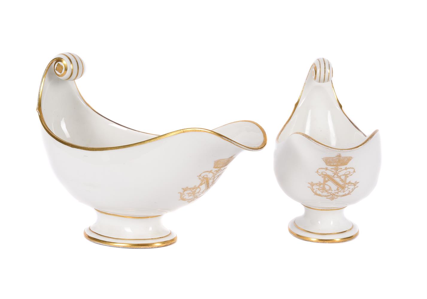 TWO SIMILAR SEVRES WHITE PORCELAIN AND GILT ETRUSCAN-SHAPE SAUCE BOATS