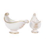 TWO SIMILAR SEVRES WHITE PORCELAIN AND GILT ETRUSCAN-SHAPE SAUCE BOATS