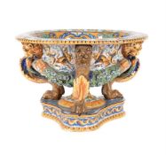 AN ITALIAN MAIOLICA ISTORIATO CENTREPIECE OR WINE COOLER IN SIXTEENTH CENTURY URBINO STYLE