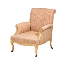 A GILTWOOD AND UPHOLSTERED ARMCHAIR IN LOUIS XV STYLE