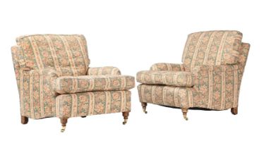 A PAIR OF WALNUT AND UPHOLSTERED ARMCHAIRS IN VICTORIAN TASTE