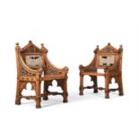 A PAIR OF VICTORIAN GOTHIC REVIVAL CARVED OAK THRONE CHAIRS, IN ECCLESIASTICAL TASTE