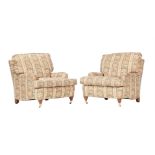 A PAIR OF WALNUT AND UPHOLSTERED ARMCHAIRS IN VICTORIAN TASTE