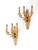 A PAIR OF ITALIAN GILT METAL WALL APPLIQUES