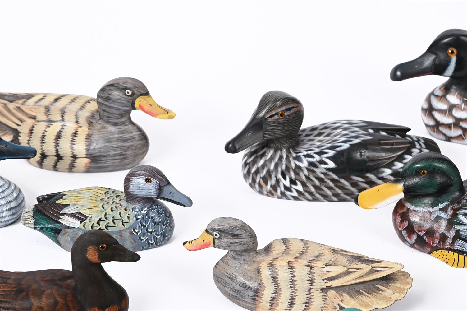 A COLLECTION OF APPROXIMATELY TWELVE CARVED AND PAINTED WOOD MODELS OF DUCKS - Image 2 of 2