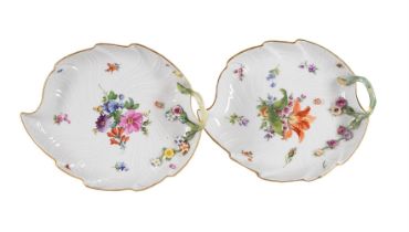 A PAIR OF MEISSEN FLOWER ENCRUSTED LEAF-SHAPED SERVING DISHES, LATE 19TH CENTURY