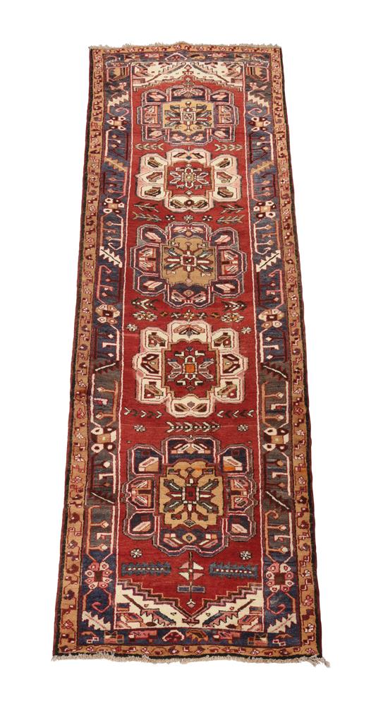 A CAUCASIAN RUNNER OR GALLERY CARPET