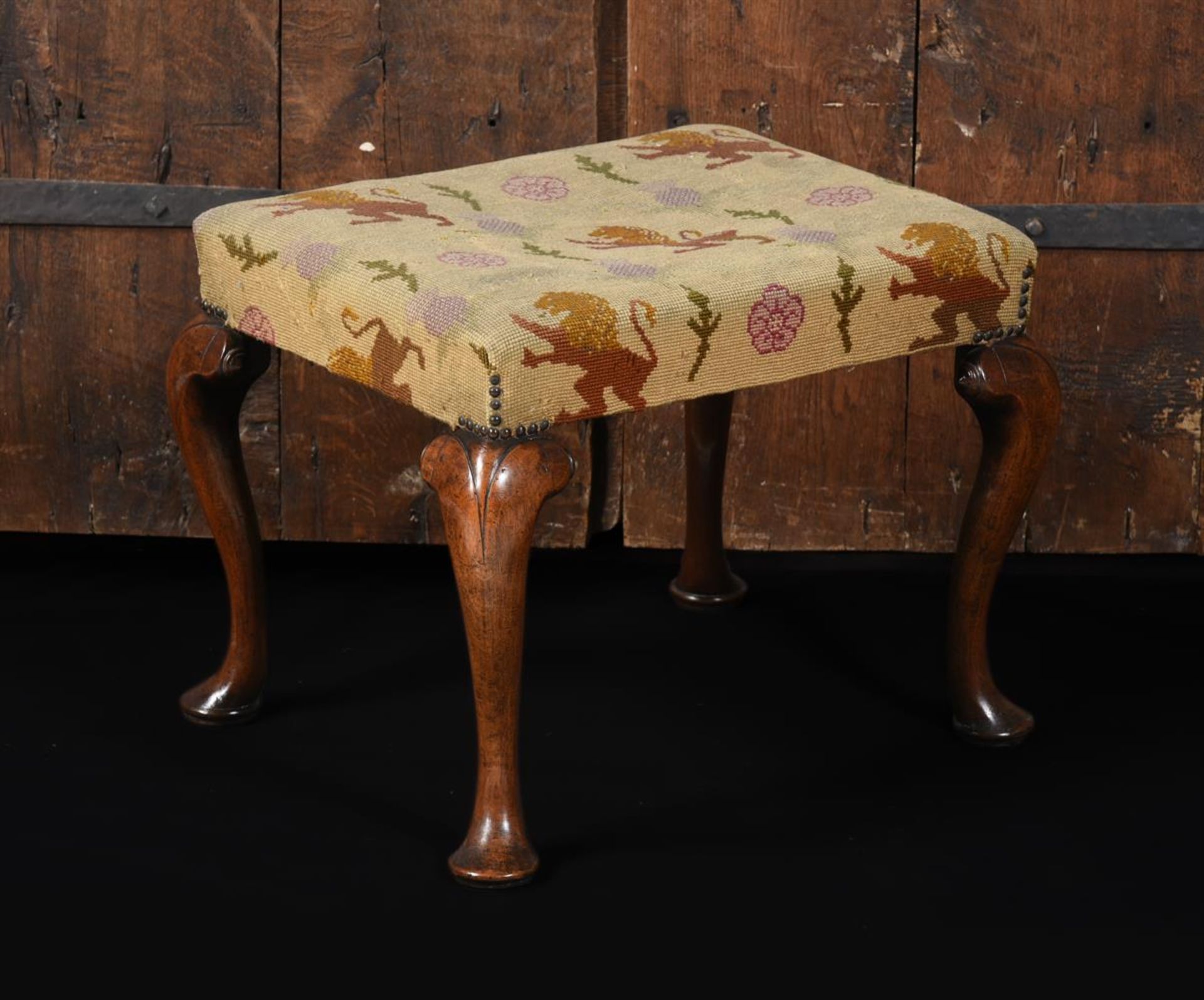 A QUEEN ANNE WALNUT STOOL, CIRCA 1710