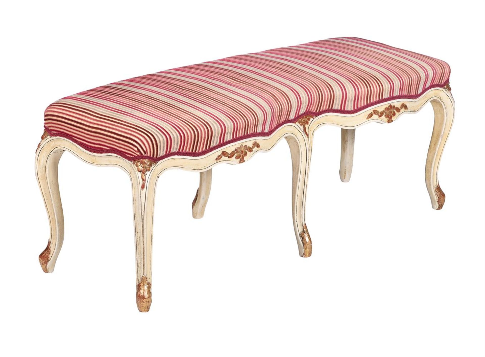 A FRENCH CREAM PAINTED AND PARCEL GILT STOOL IN LOUIS XV STYLE