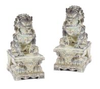 A PAIR OF CHINESE ARCHAISTIC BRONZE GUARDIAN LIONS, 20TH CENTURY