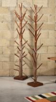 A PAIR OF HARDWOOD TREE BRANCH HAT AND COAT STANDS