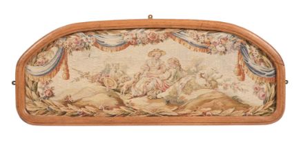 A FRENCH TAPESTRY COVERED OVERDOOR