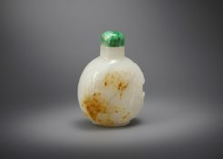 A Chinese white and russet jade snuff bottle
