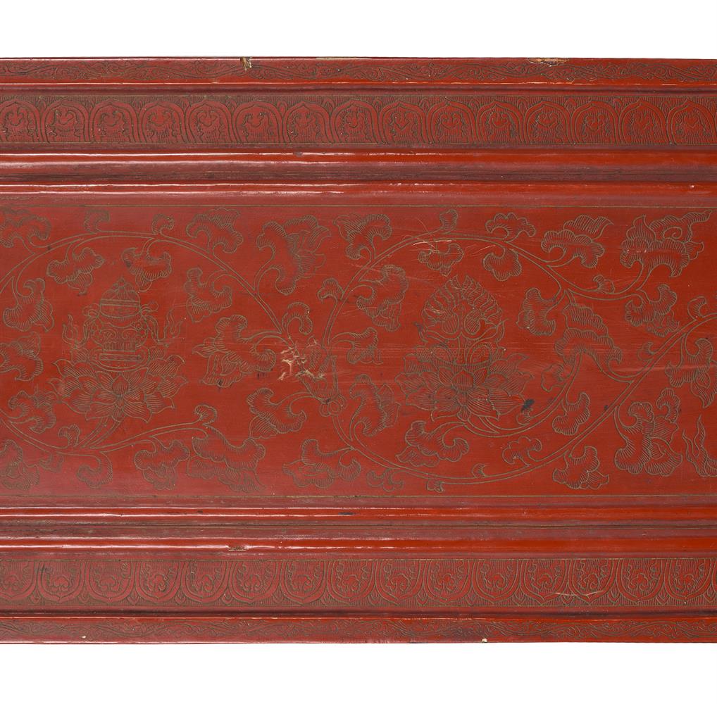 A Tibetan incised red lacquer wood book cover - Image 2 of 3