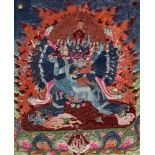 A Tibetan embroidered silk Thang-ka depicting Vajrabhairava