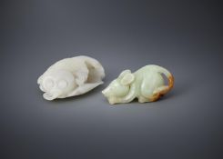 A Chinese white jade carving of goldfish