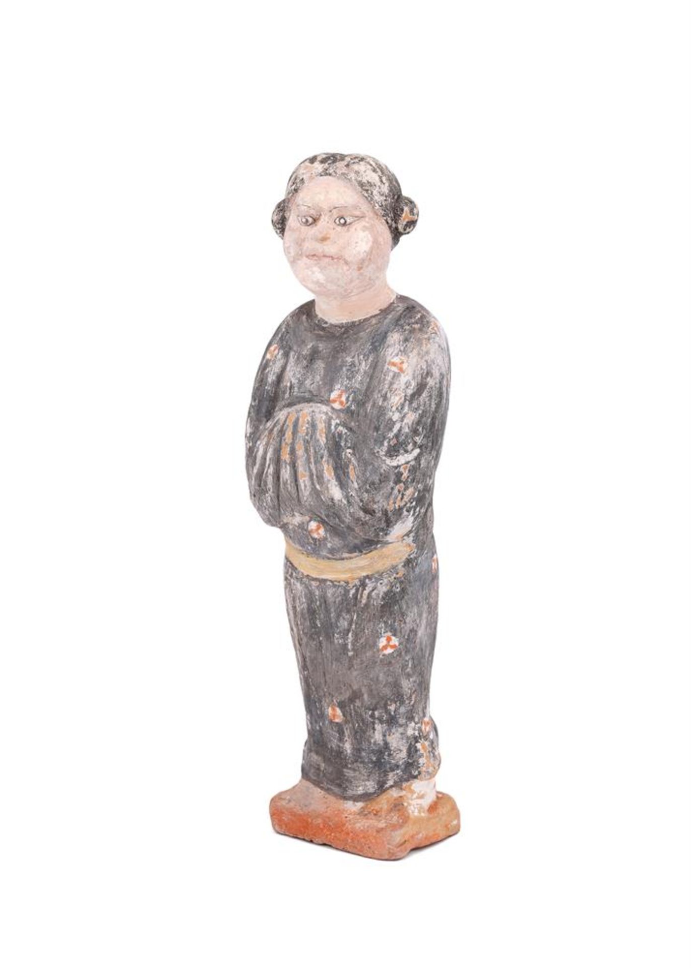 A Chinese painted pottery figure of an attendant