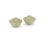 A pair of celadon jadeite bowls and covers