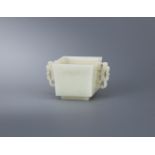 A Chinese pale celadon jade square twin-handled censer
