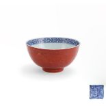 A Chinese 'Kinrande' and iron-red decorated blue and white bowl