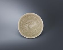 A Chinese Yaozhou celadon conical bowl