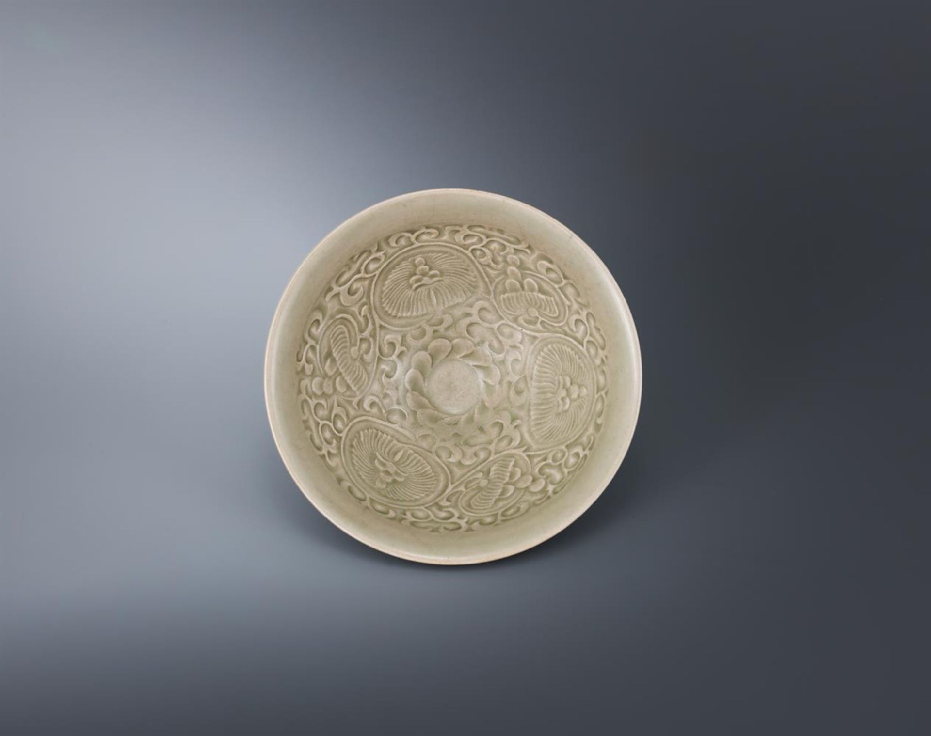 A Chinese Yaozhou celadon conical bowl