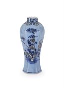 A Chinese copper-red decorated blue-ground sectioned vase