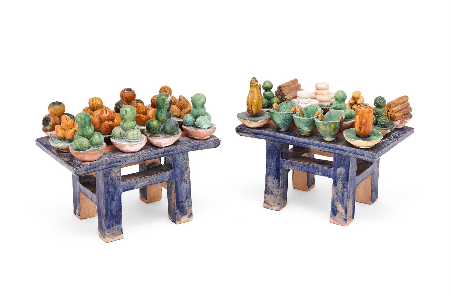 A pair of chinese sancai-glazed tables with dishes of fruit and breads and pouring vessels - Image 2 of 3