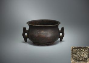 A Chinese bronze twin-handled censer