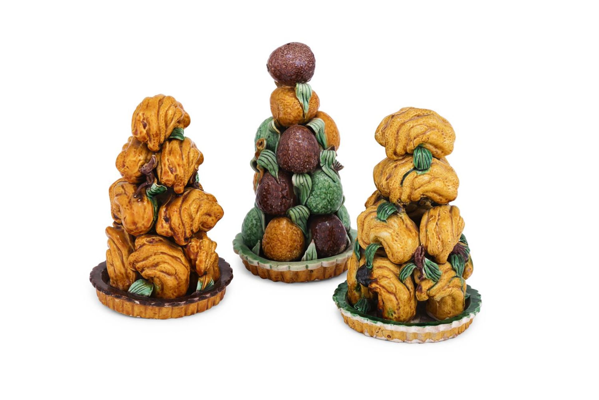 Two similar Chinese sancai-glazed biscuit porcelain fruit towers